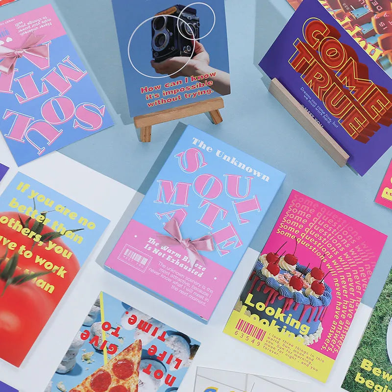 Boxed set of two fresh style printed postcards with messages 'Time Not Arrived' and 'Warm Wind Not Exhausted'.