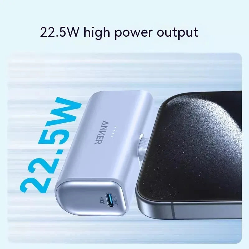 Small capsule-shaped power bank in multiple colours with a fold-out USB-C cable.