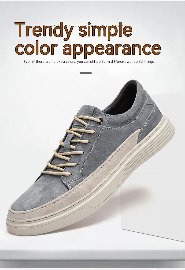 Men's grey casual leather skate shoes with round toe and low-top design on a rubber sole.