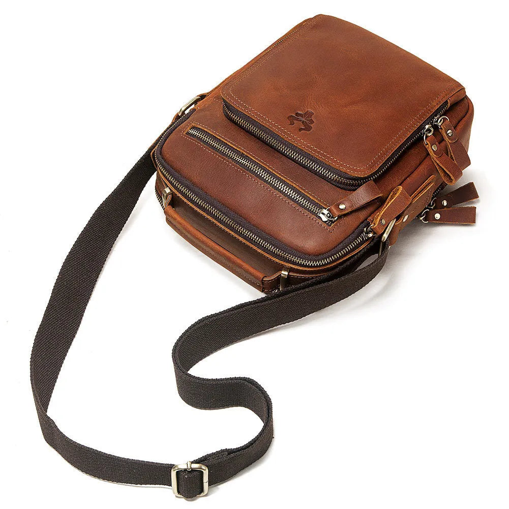 Men's brown genuine leather crossbody bag with single shoulder strap and visible stitching