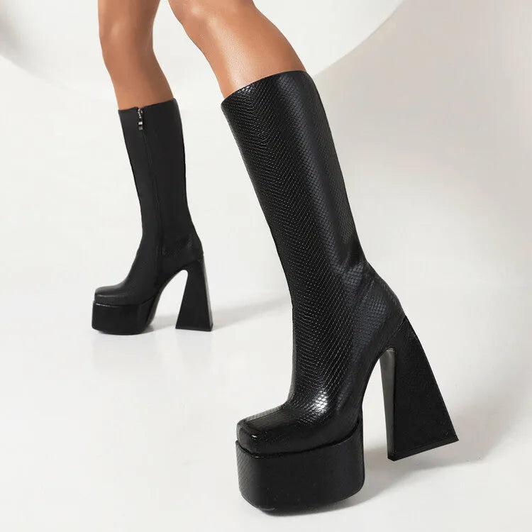 Women's black casual ankle boots with a chunky heel made from PU artificial leather.