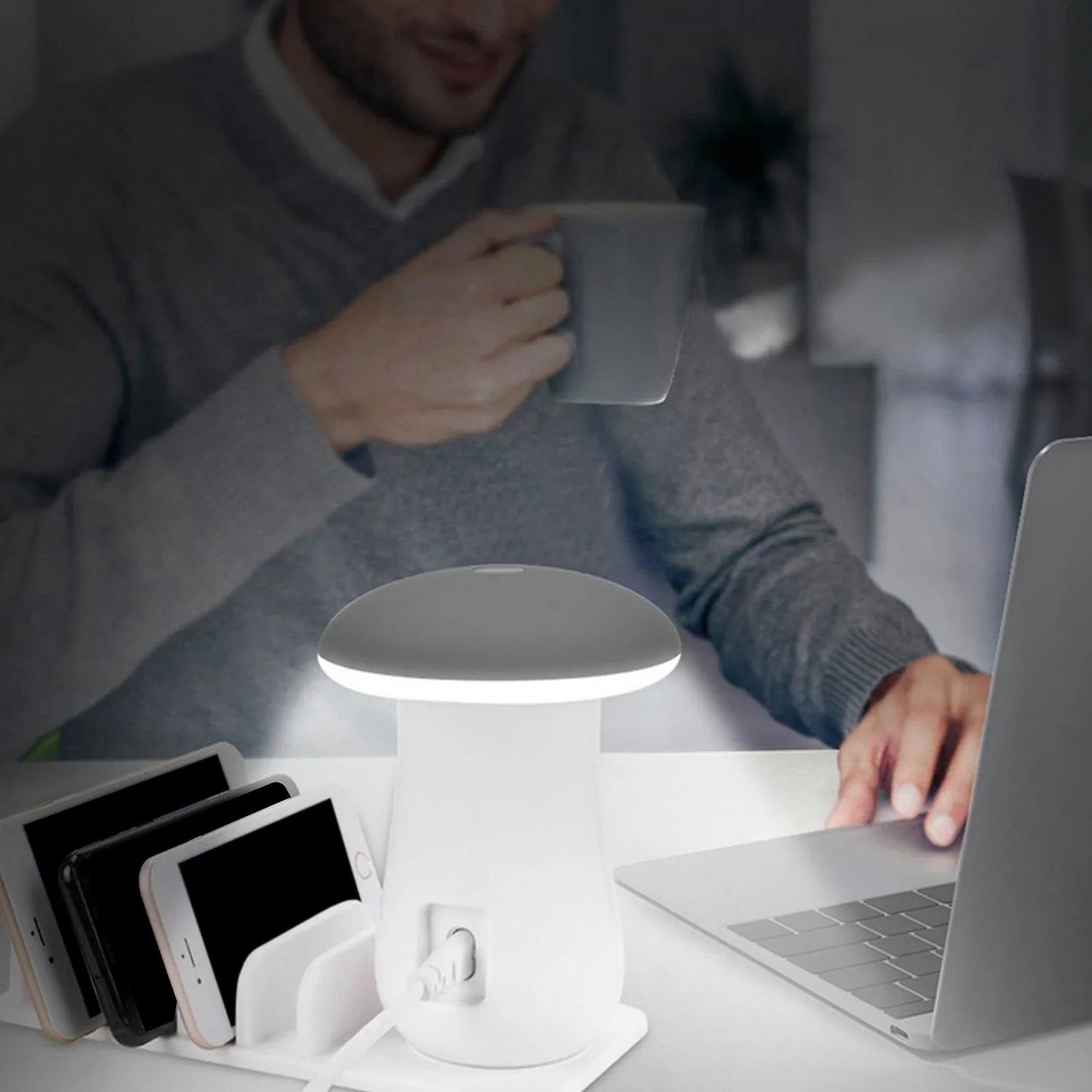 White mushroom-shaped LED desk lamp with a 5-port USB charging station at its base on a wooden table.