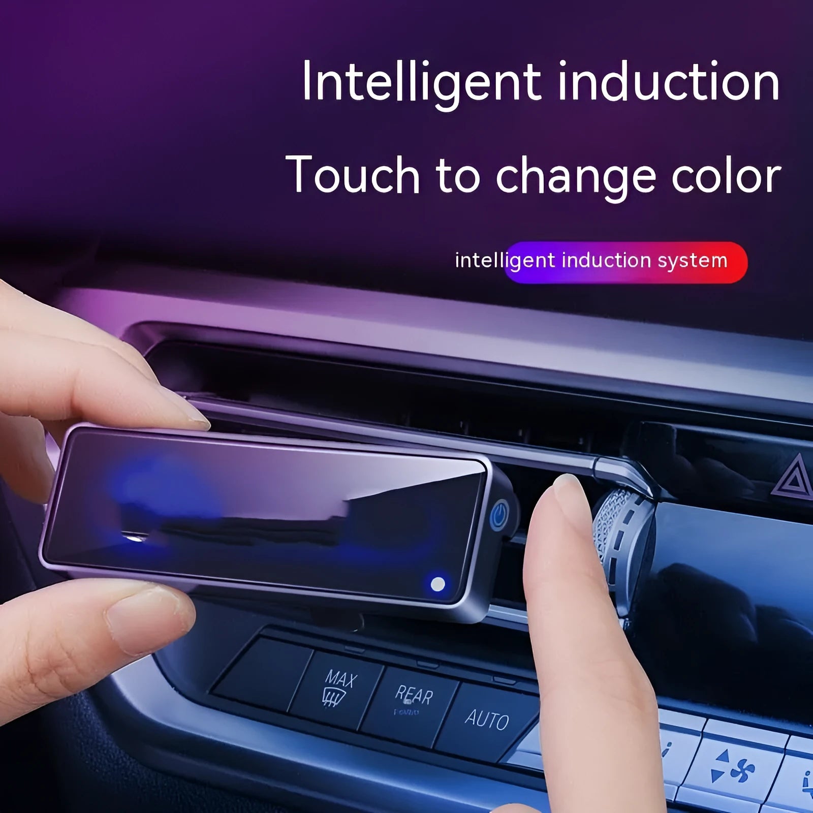 Black automobile aromatherapy LED light attached to a car air vent with a fragrance stick.
