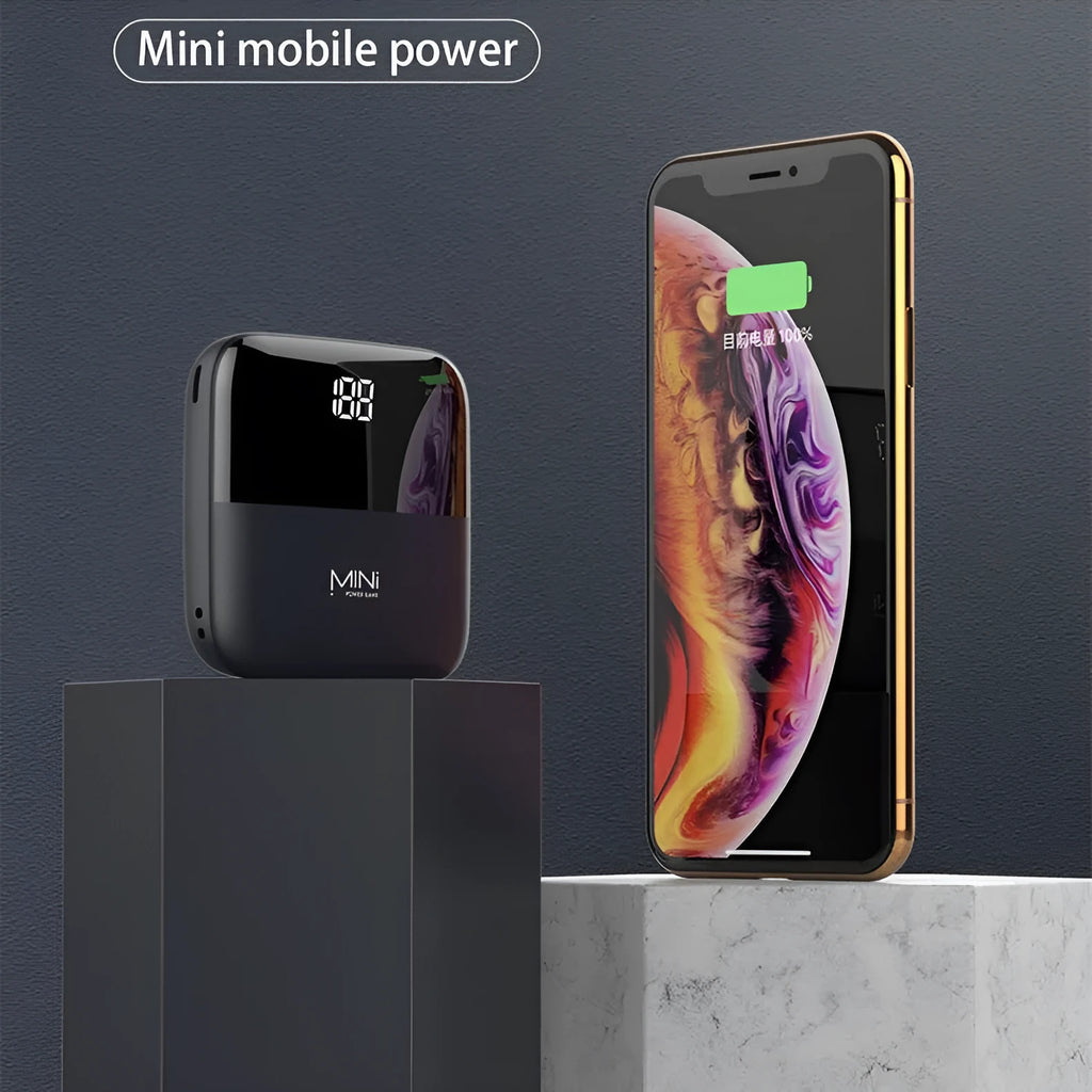 Black 10000mAh portable power bank with digital display showing battery percentage and dual USB ports.