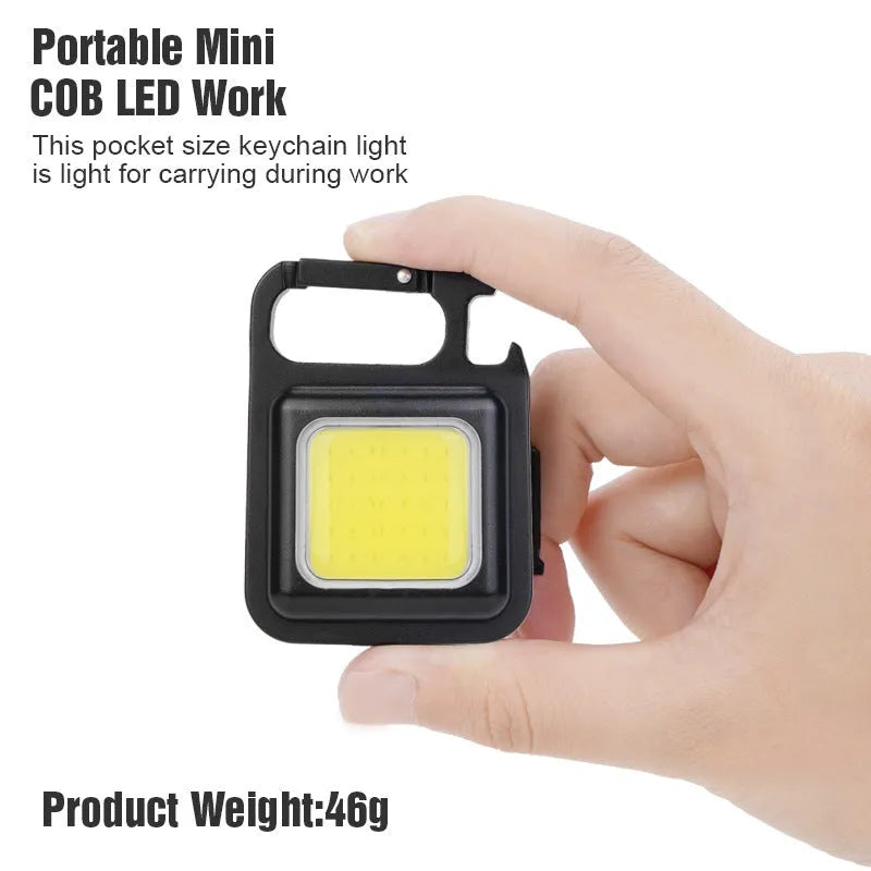Black aluminum alloy USB rechargeable keychain light with magnetic base and foldable handle