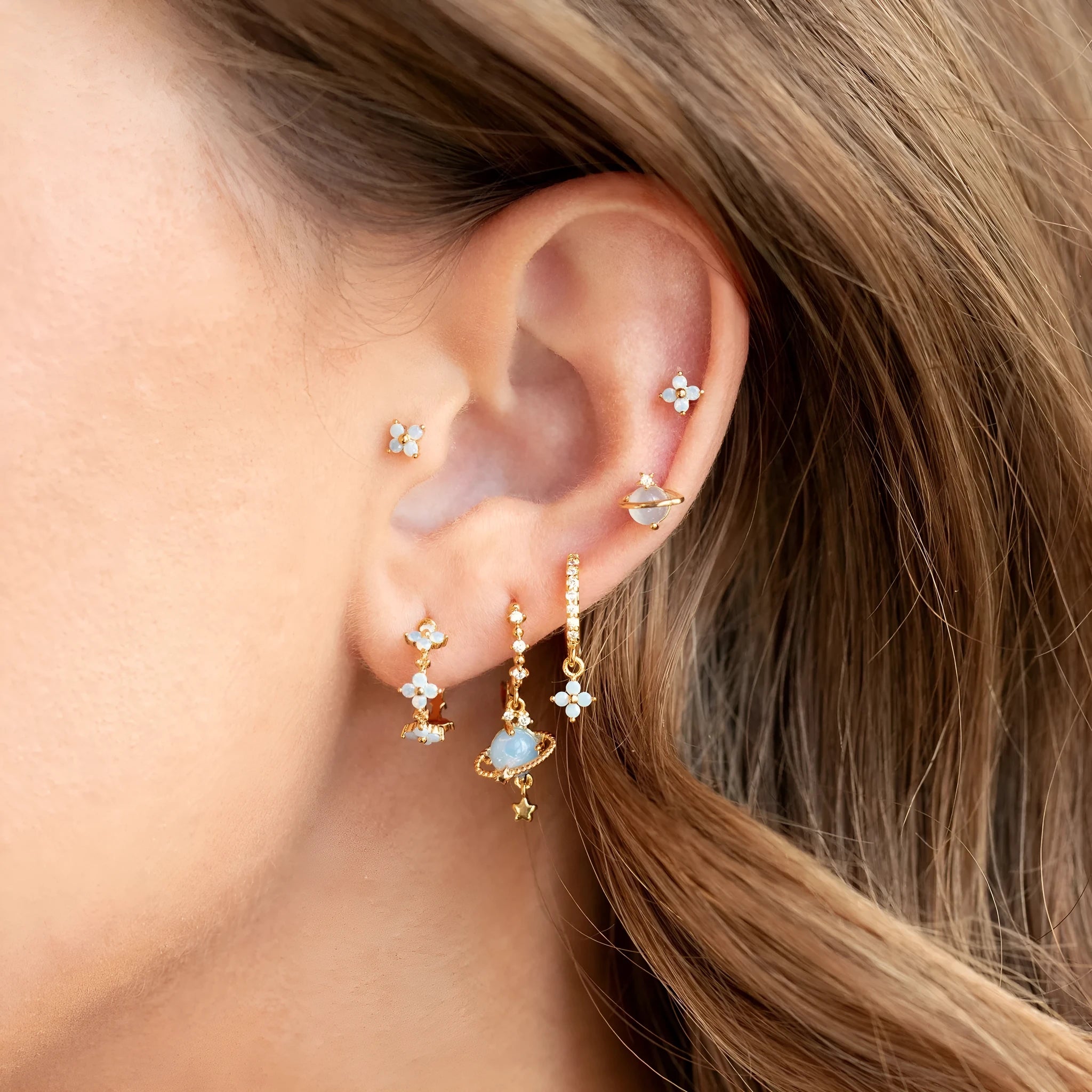 Flower design ear studs with zircon mosaic detail in gold and silver colours