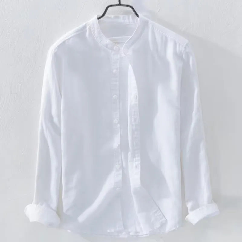 Loose fit long sleeve cotton linen shirt in solid colours on a hanger.