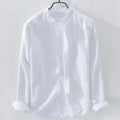 Loose fit long sleeve cotton linen shirt in solid colours on a hanger.