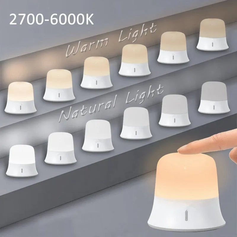 White bedside nursing night light with touch controls showing dimming and colour options