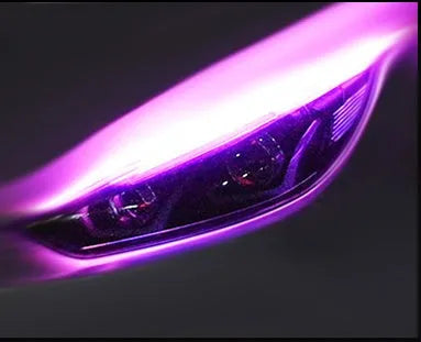 Blue and yellow LED car light strip installed on a vehicle headlight