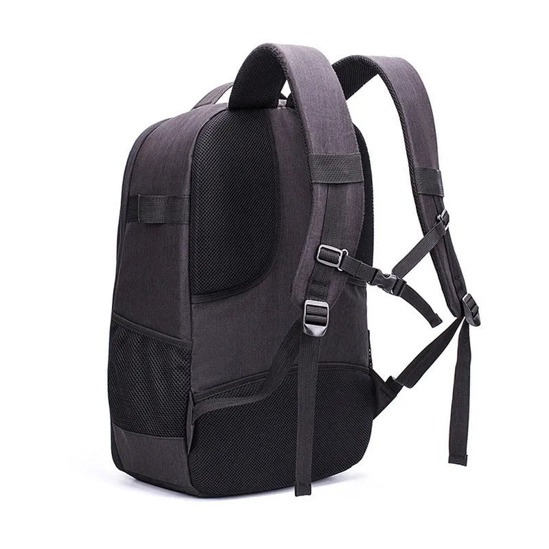 Black Oxford cloth drone backpack with camera and laptop compartments open.