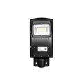 Integrated solar street light unit with solar panel and LED light in single housing for outdoor use