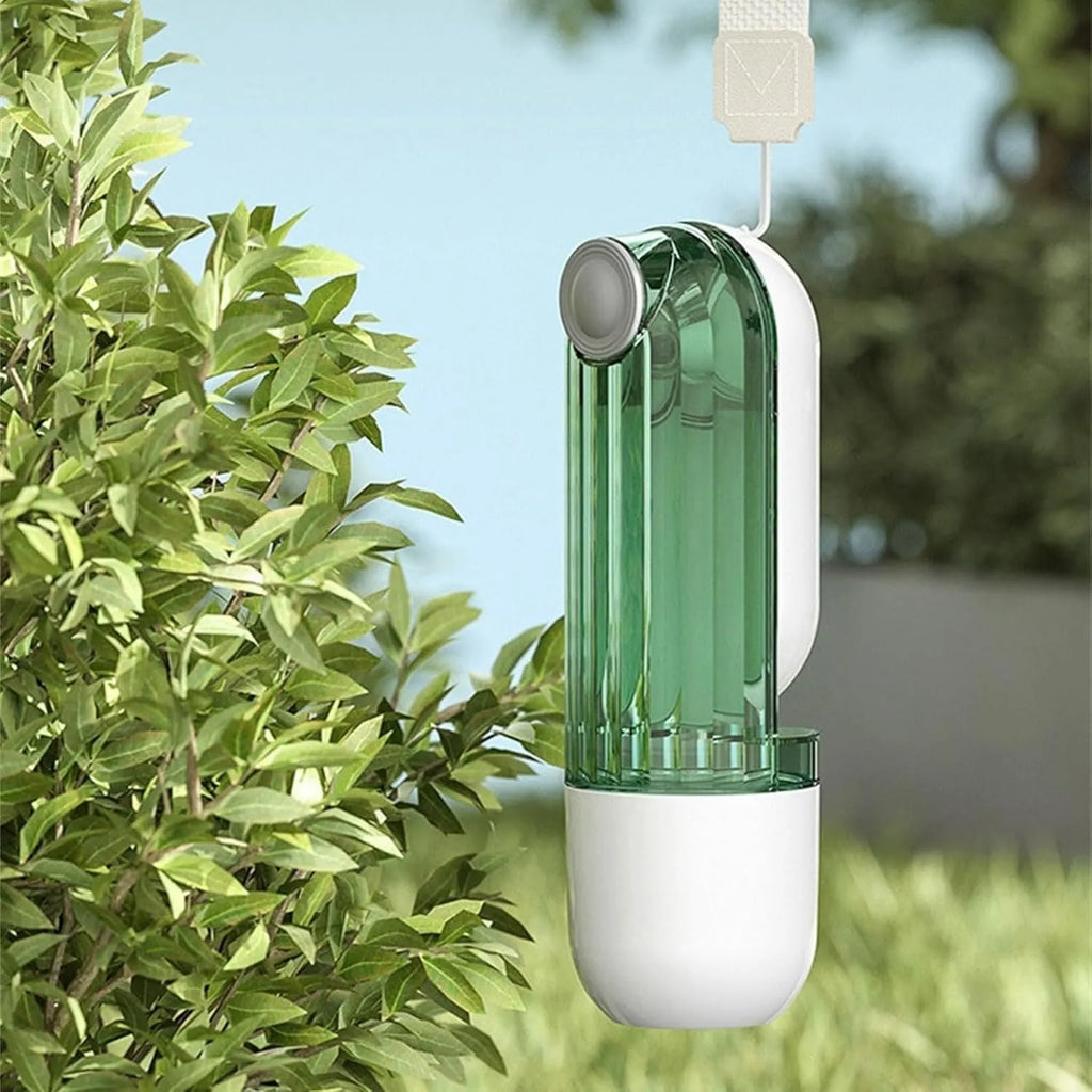 Beige and green foldable dog water bottle with food dispenser shown collapsed and open.