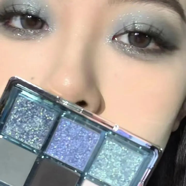MUGELEEN nine-colour eye shadow palette showing low saturation shades with matte and shimmer finishes