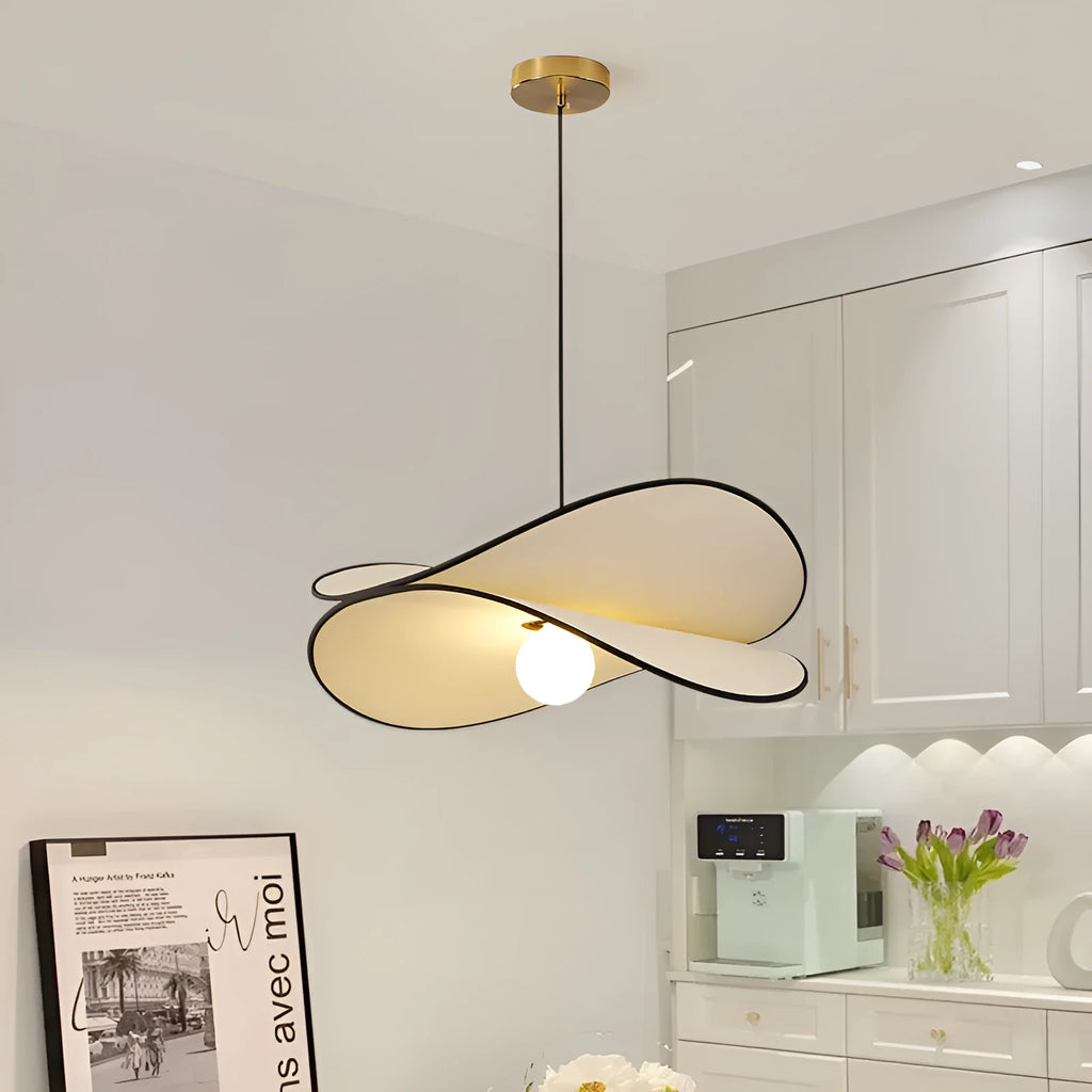 French artistic modern fabric potato chips chandelier pendant light in a bedroom setting.