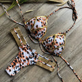 Women's bikini set with push-up pads, no underwire, in leopard print and snakeskin pattern options.