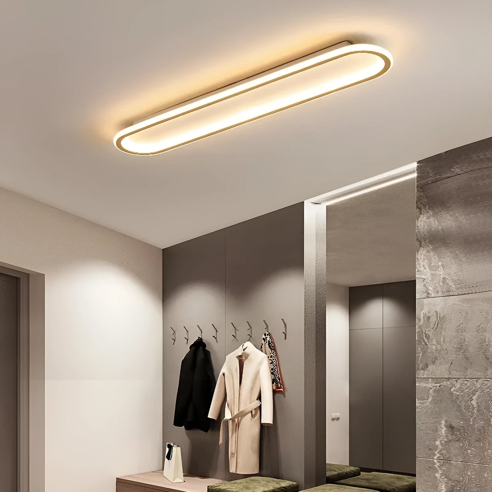 Minimalist aluminium strip ceiling lamp in black finish, shown mounted on a white ceiling.