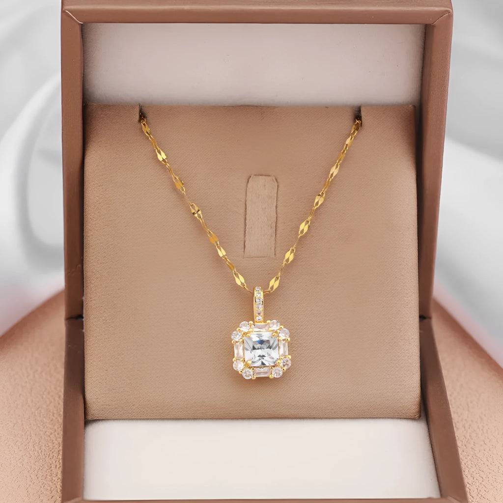 Women's geometric clavicle chain with quadrilateral pendant containing mixed gem inlays on water wave titanium steel chain