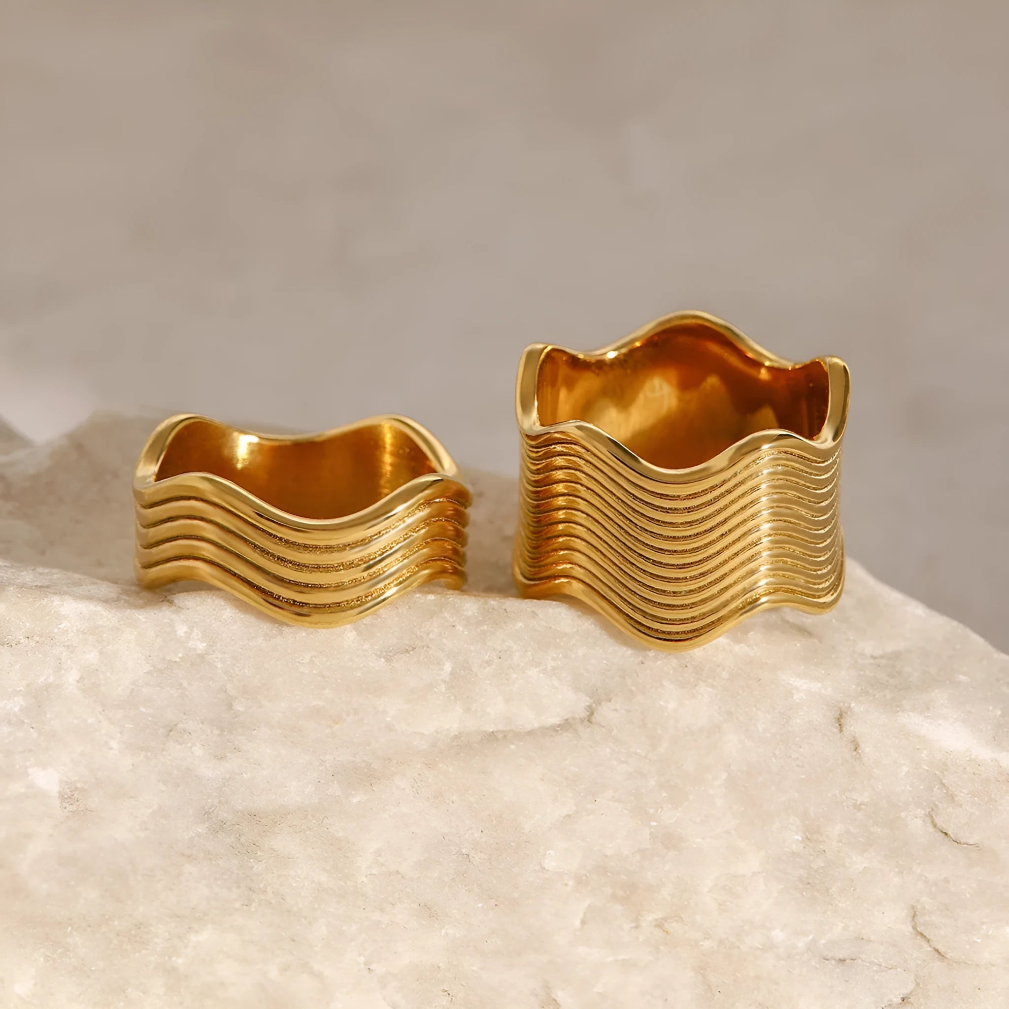 Stainless steel geometric wave ring with a wide surface, Korean-style women's fashion jewellery.