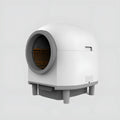 White automatic cat litter box with enclosed design for indoor use