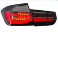 BMW 3 Series red and smoked black LED tail light assembly with streamer indicators