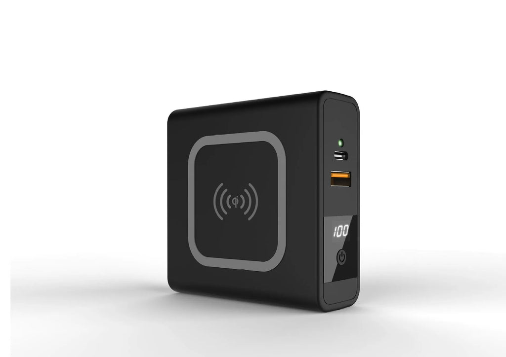 Black and white Super QI wireless charging power bank with built-in plug and international adapters.