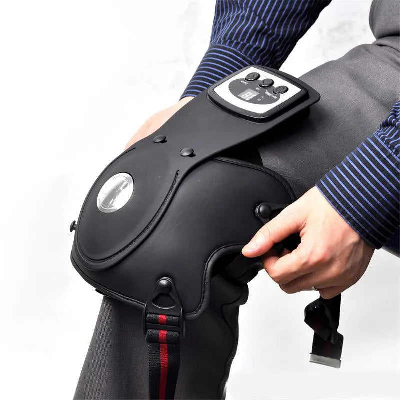 Infrared knee and shoulder massager with adjustable temperature control, knee pads, shoulder pads, and power adapter.