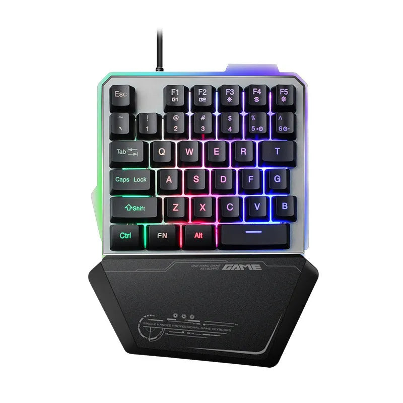 Black G40 one-handed mechanical keyboard with RGB backlighting on a desk.