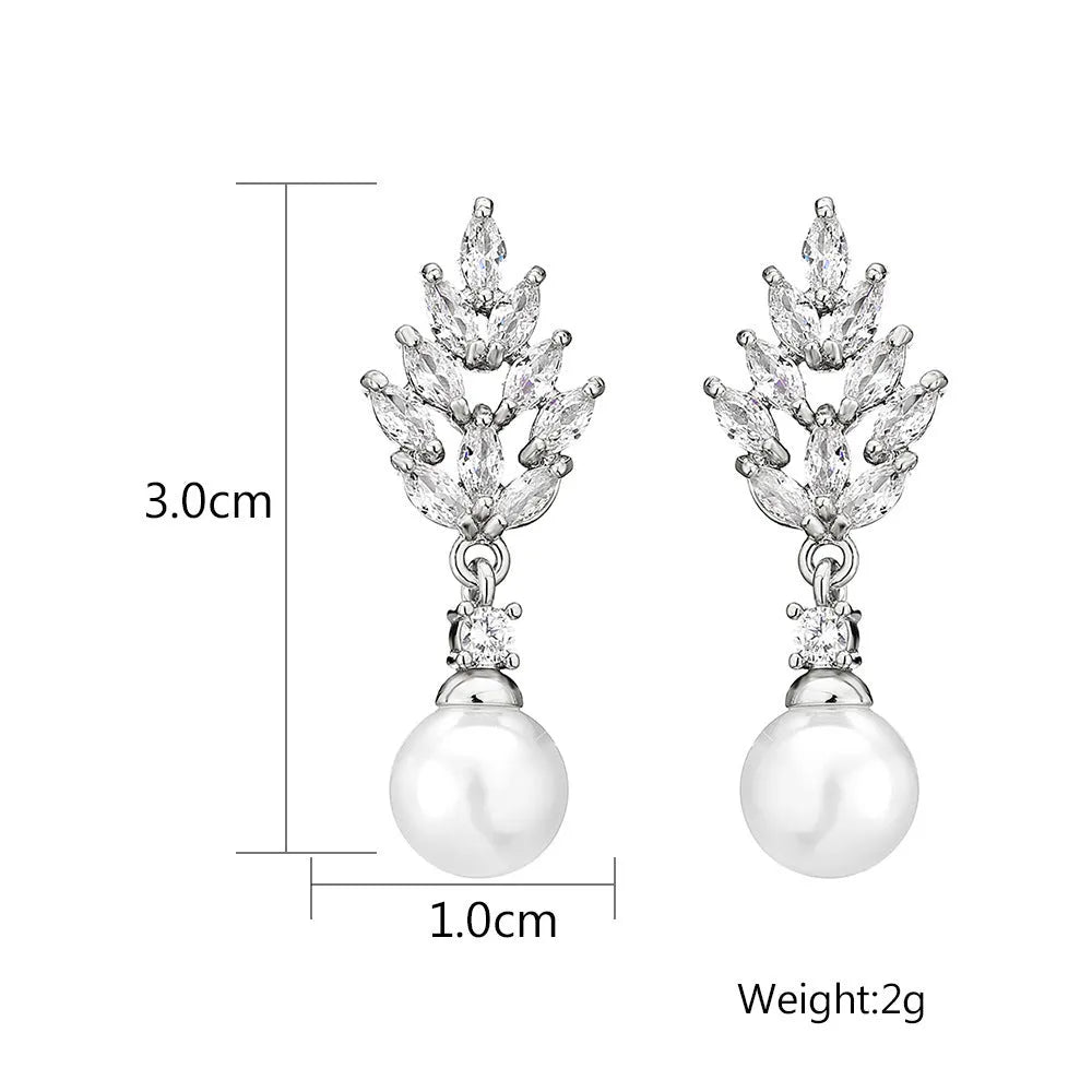 Geometric floral earrings with micro-set zircon stones in gold, platinum, or rose gold plating.