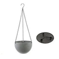 A 210mm diameter plastic hanging basket with inner tank and chain in one of seven available colours.