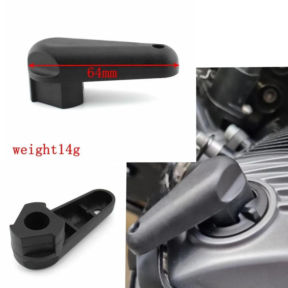 Black adhesive-backed quick release wrench for BMW motorcycle engine oil cap.