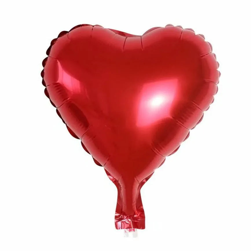 Five peach heart shaped aluminum balloons in metallic colours for party decorations