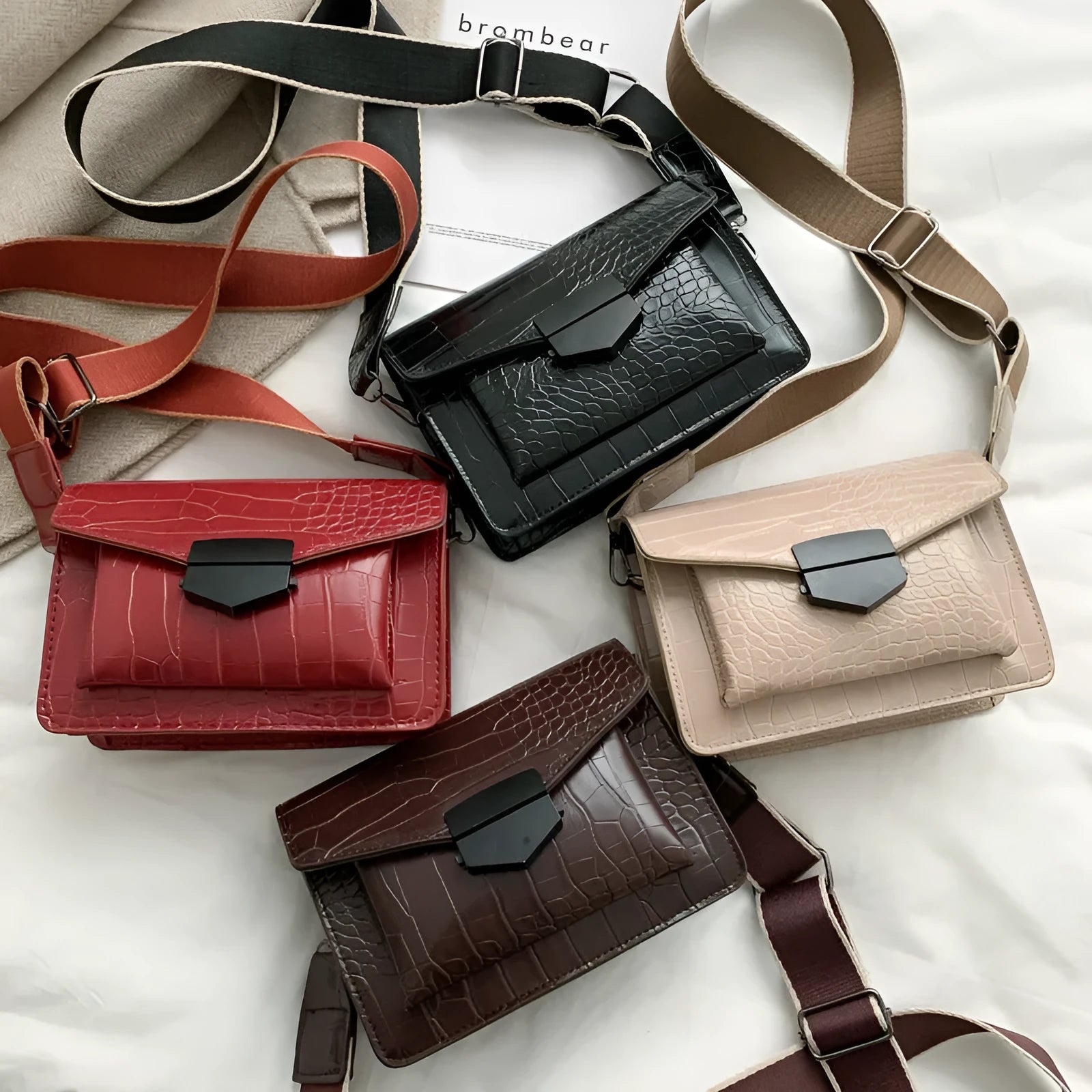 Vintage PU leather crossbody bag in black showing 20cm width and crossbody strap