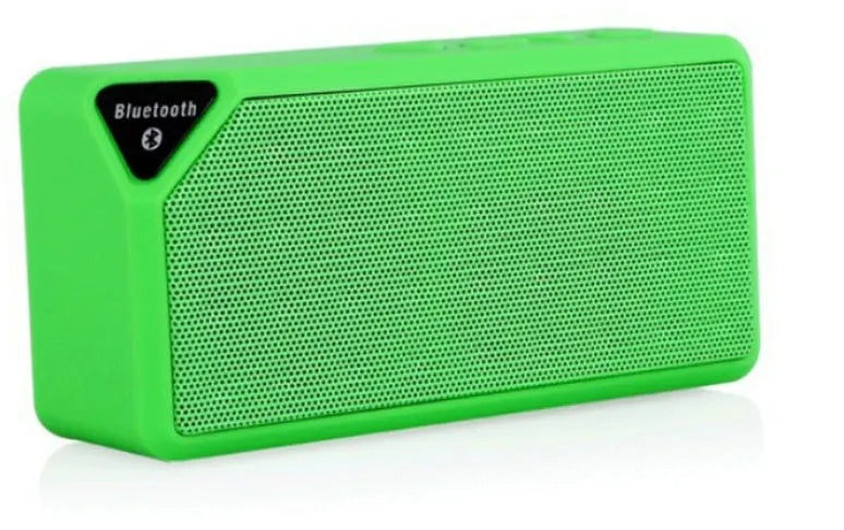 Cannon X3 small cube-shaped portable Bluetooth speaker with FM radio, shown in available colours: black, blue, green, red, yellow.