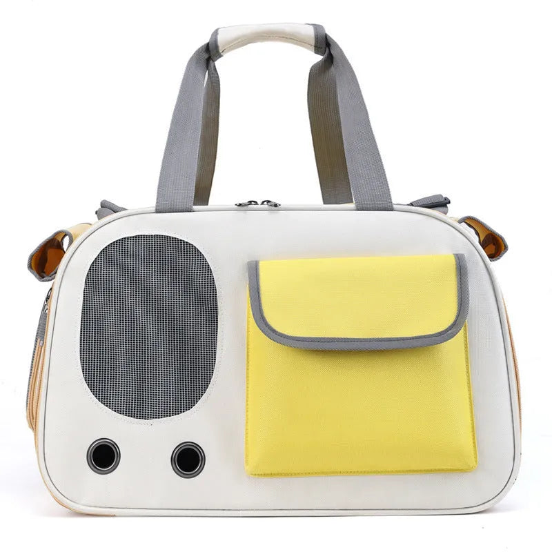 Yellow foldable canvas pet carrier bag with single shoulder strap, shown open.