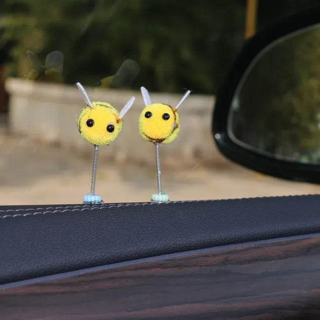 Yellow and black fur ball bee car decoration measuring 3x3 cm