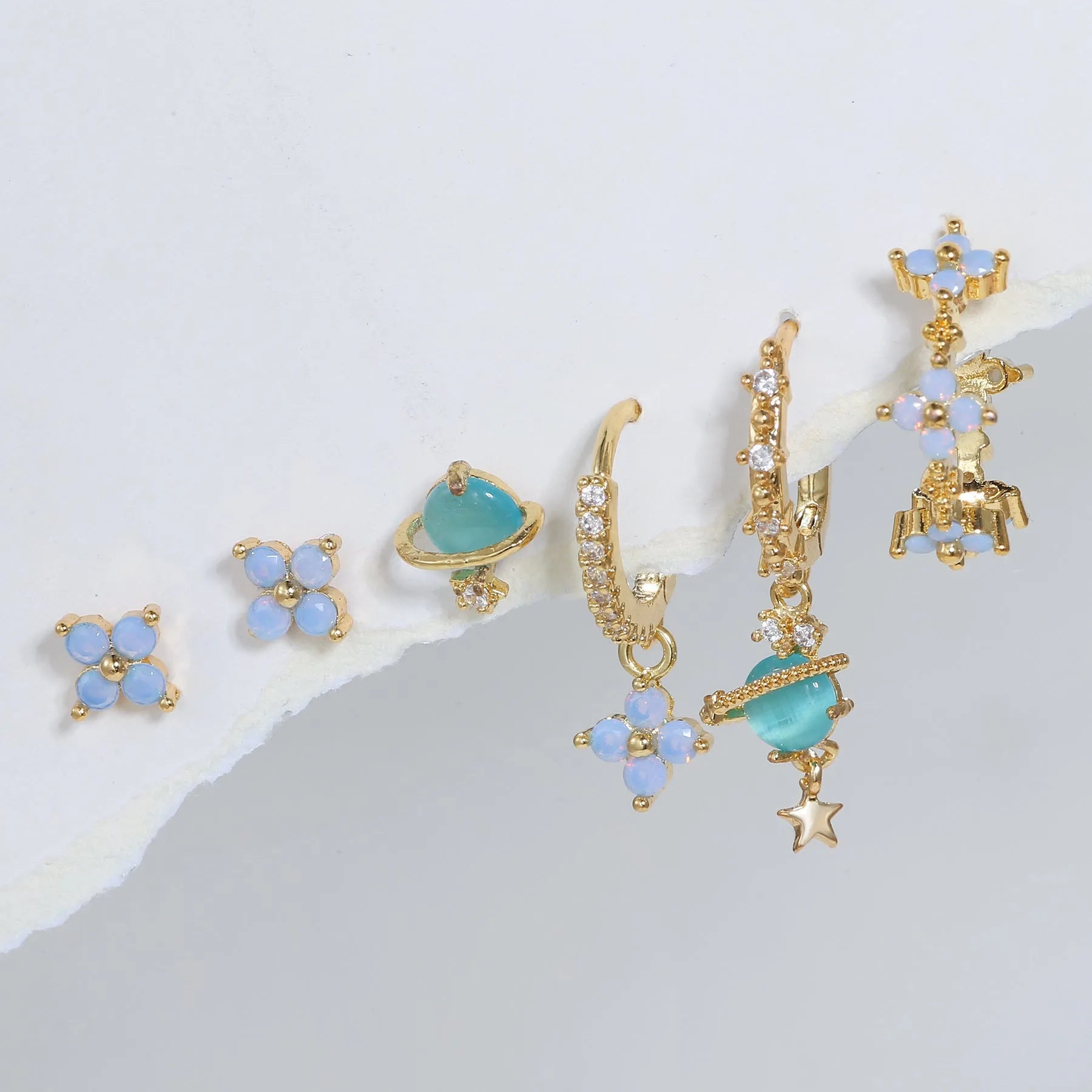 Flower design ear studs with zircon mosaic detail in gold and silver colours