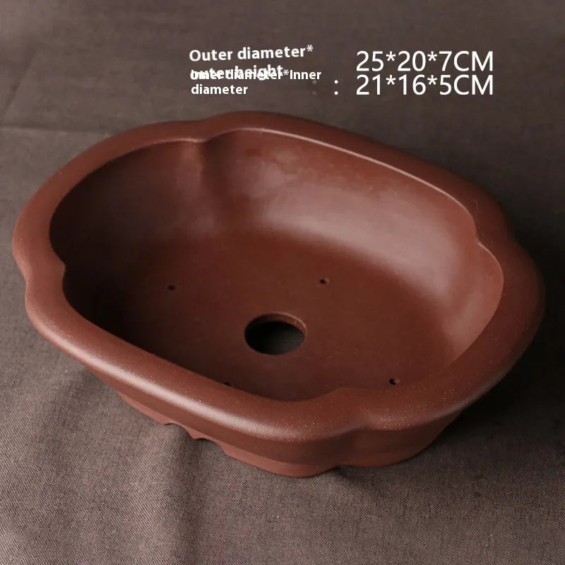 Handmade purple clay bonsai basin with traditional Chinese plain design measuring 25x20x7cm
