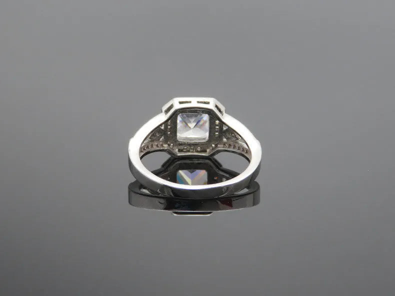 Geometric women's zircon ring with hollow ornament design in platinum colour