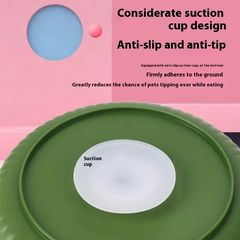 Plastic pet slow feeder bowl with a blue silicone windmill-pattern licking mat inside.