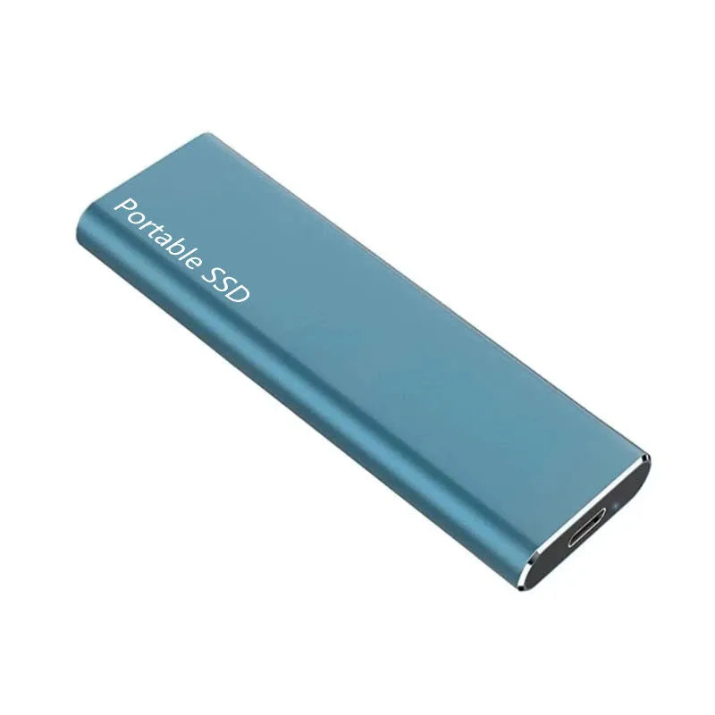 Ultra-thin metal portable external SSD drive in red, shown next to a laptop.