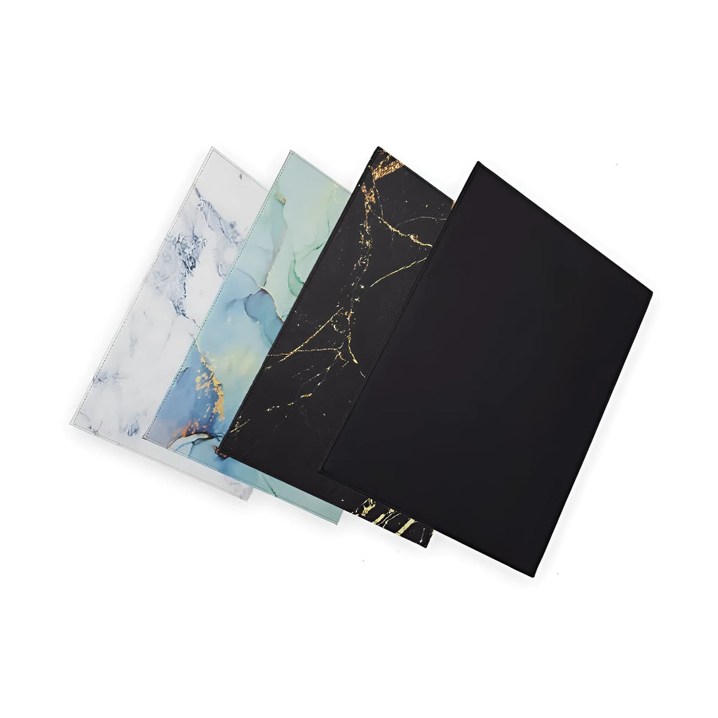 Durable heat-insulating anti-radiation tablet pad in four colour variations on a desk