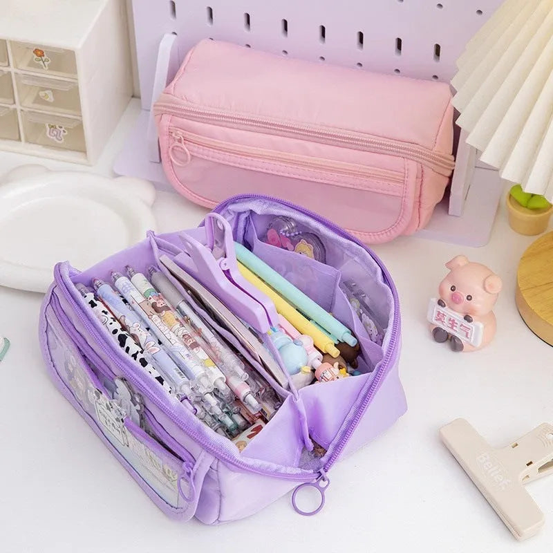 Canvas pencil case with ten flip layers open, showing compartments, in premium Black colour.