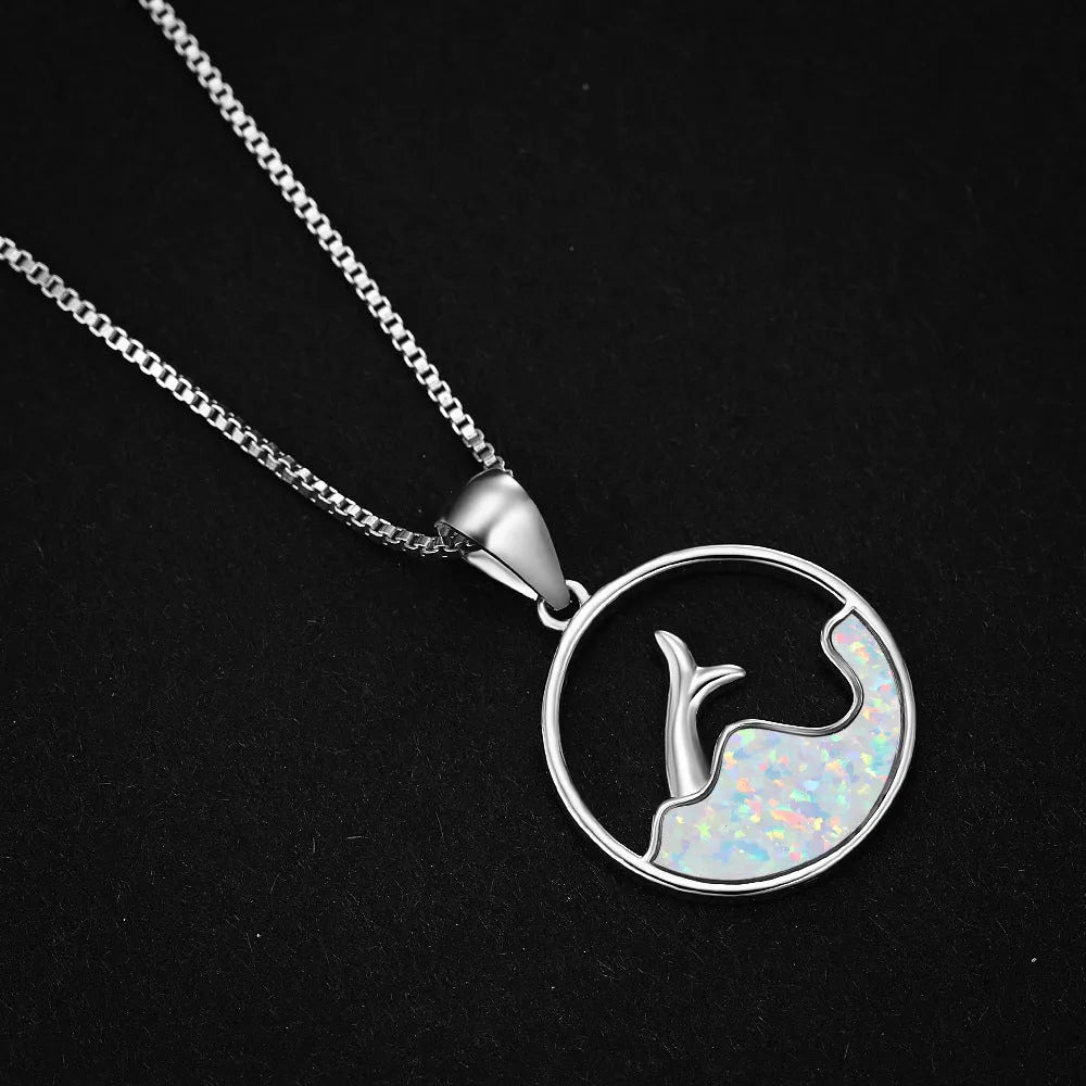 Round blue opal fishtail geometric pendant necklace on a chain, platinum electroplated copper finish.