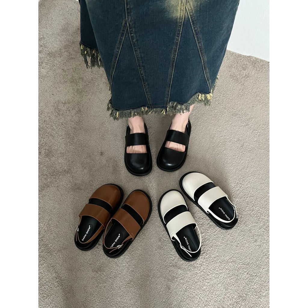 Retro raised bottom sandals with closed toe and ankle strap buckle in apricot colour