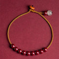Hand-woven cinnabar bracelet with geometric design and traditional Chinese style