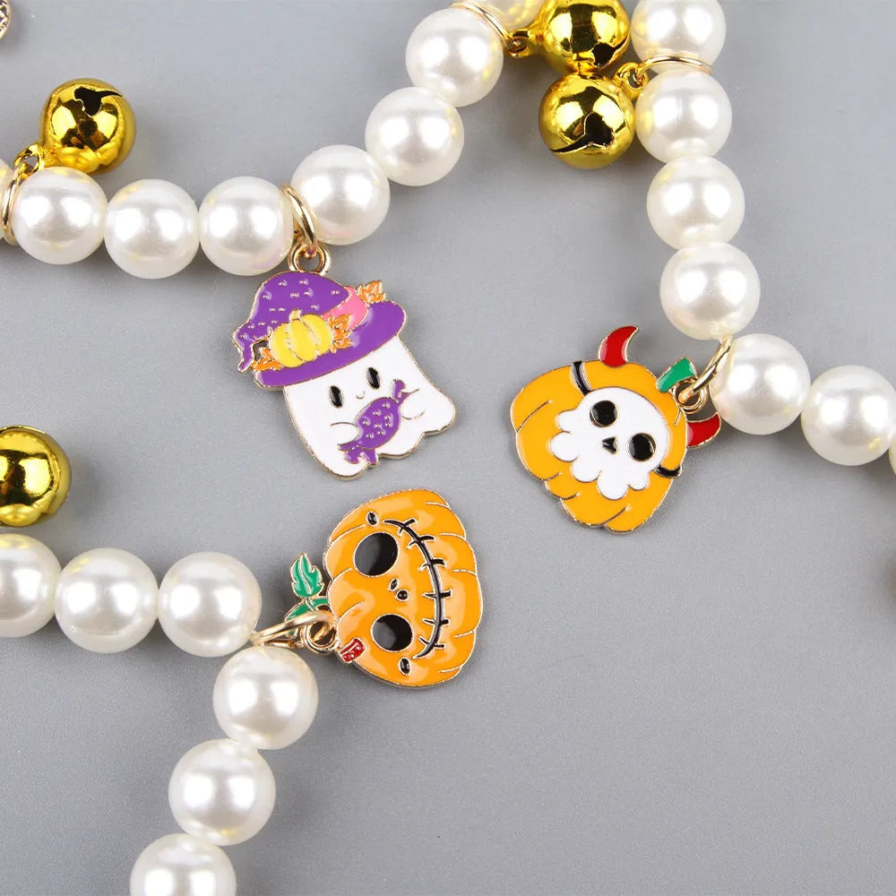 Purple Halloween cat collar with simulated pearl necklace decoration showing pumpkin designs