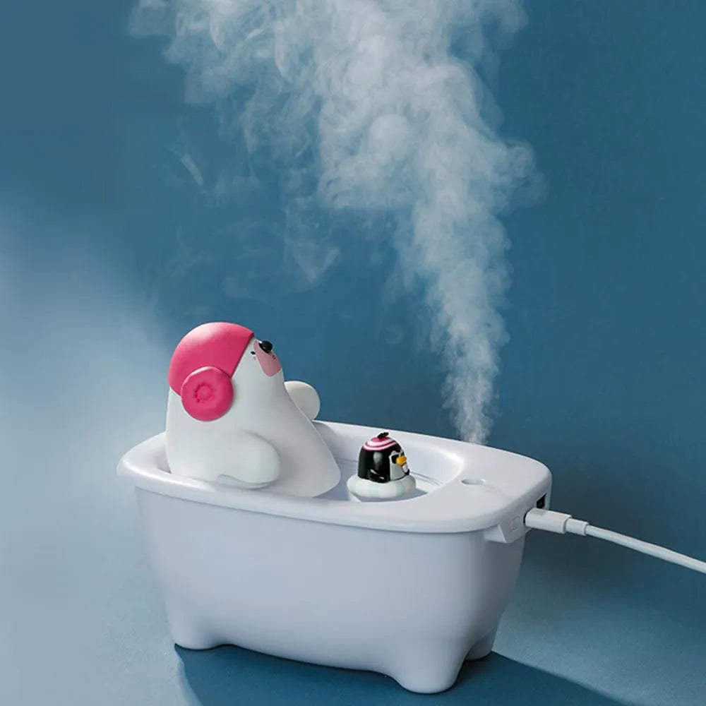White USB-powered desktop air humidifier with 550ml water tank on a desk