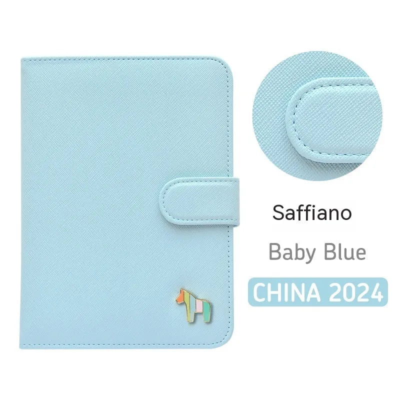 Compact leather-covered 396-day schedule book for hand accounting, shown lying open flat.