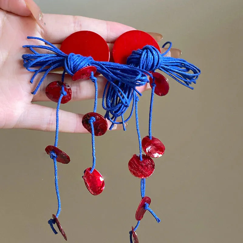Geometric women's earrings with cloth construction, silver needle and blue resin flower accents